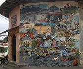 Mur peint à Masaya. On peut reconnaître divers monuments de la ville, Saint-Jérôme, les fêtes folkloriques, le lac et le volcan.